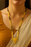 Gold‑Plated Black Bead Mangalsutra with Floral Pendant | Traditional Designer Jewelry